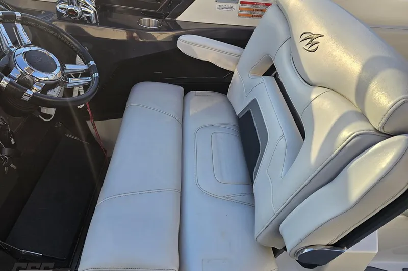 Slide: The Image of Luxurious interior of a 2011 Monterey 328SS Super Sport boat with plush seating. - 55