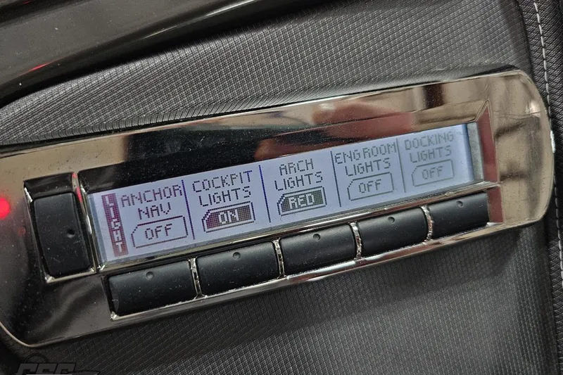 Slide: The Image of Control panel of a 2011 Monterey 328SS Super Sport boat, showing light settings. - 59