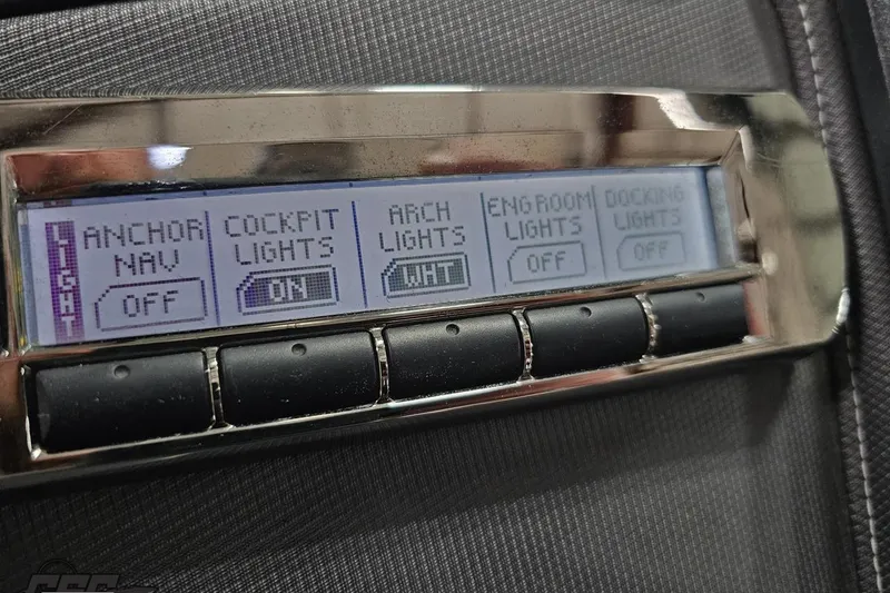 Slide: The Image of Control panel of a 2011 Monterey 328SS Super Sport boat, showing light settings. - 60