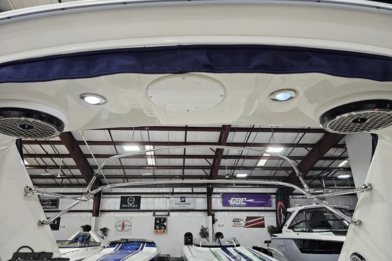 Slide: The Image of Interior view of a 2011 Monterey 328SS Super Sport boat in a showroom. - 63