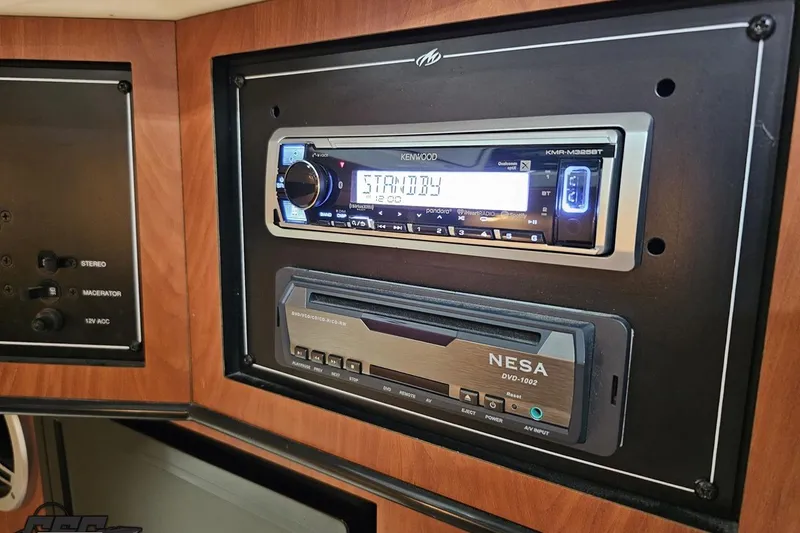 Slide: The Image of Kenwood stereo and NESA DVD player in 2011 Monterey 328SS Super Sport boat. - 70