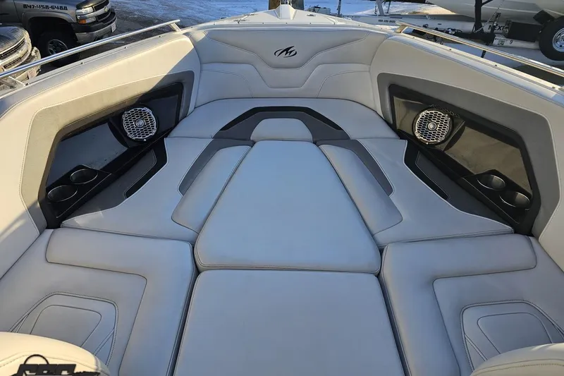 Slide: The Image of Luxurious interior of 2011 Monterey 328SS Super Sport boat with cushioned seating and speakers. - 90