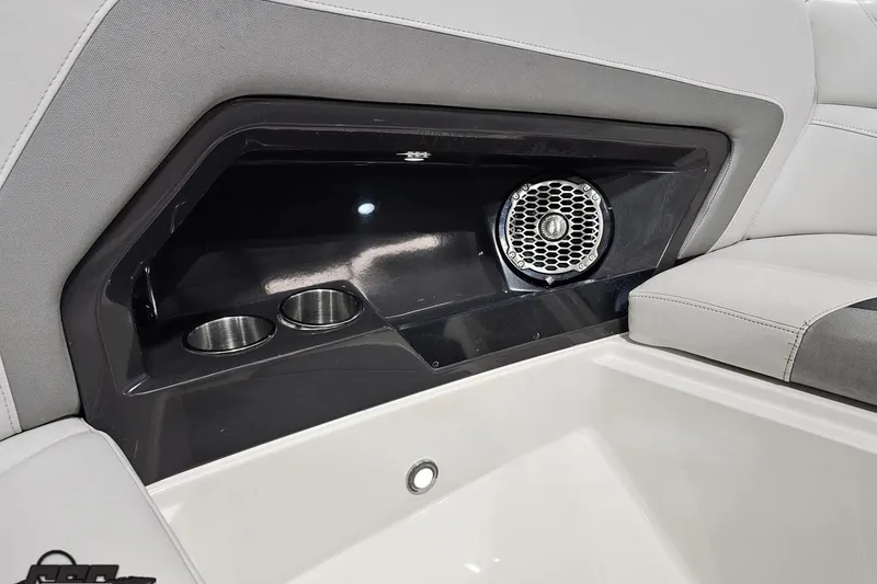 Slide: The Image of Interior of 2011 Monterey 328SS Super Sport boat with speaker and cup holders. - 92