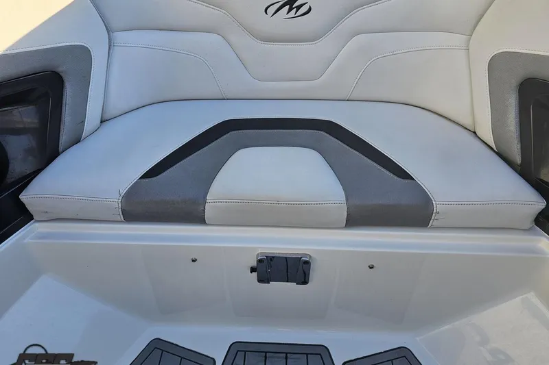 Slide: The Image of 2011 Monterey 328SS Super Sport boat seat with gray and white upholstery. - 93
