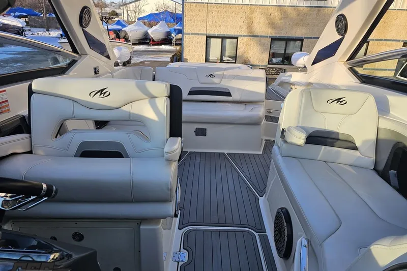 Slide: The Image of Interior of a 2011 Monterey 328SS Super Sport boat with luxurious seating. - 94
