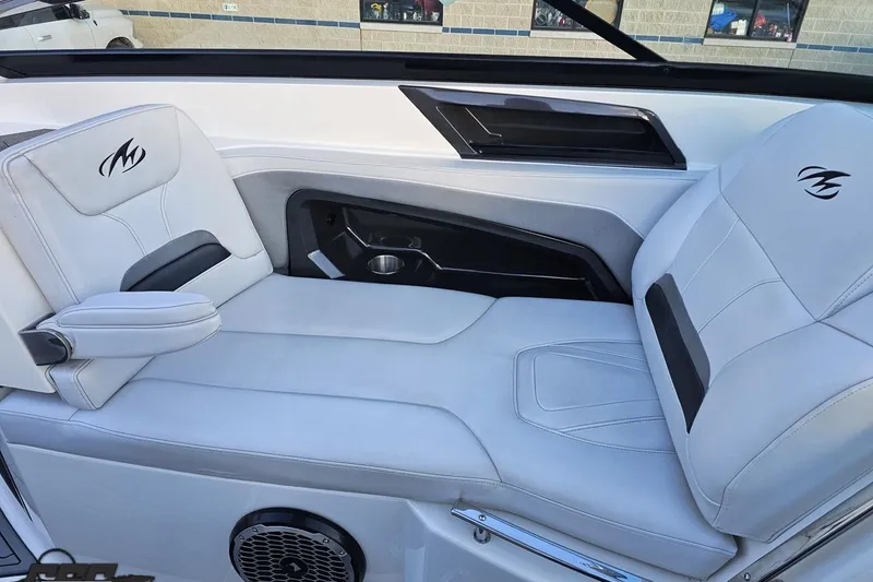 Slide: The Image of Interior of a 2011 Monterey 328SS Super Sport boat with white seating. - 98