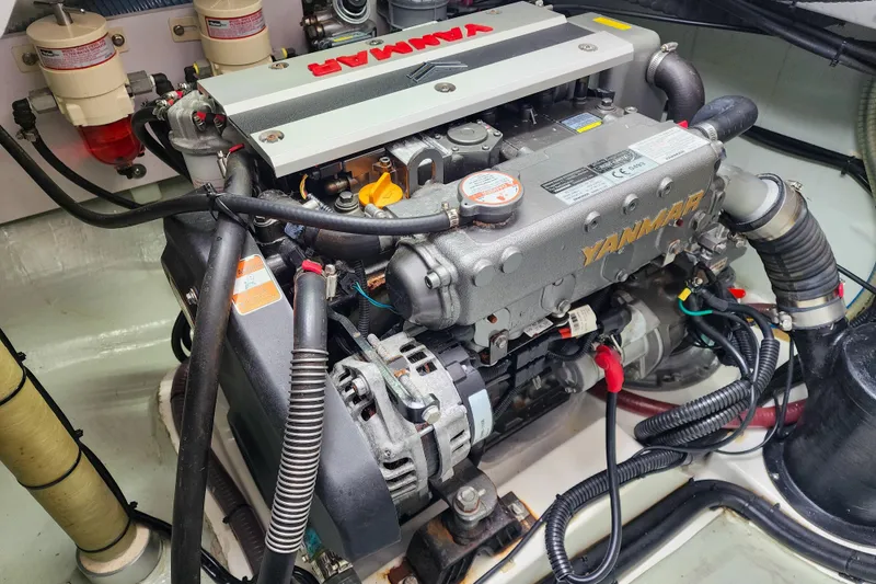 Slide: The Image of Engine compartment of a 2020 Leopard 45 catamaran featuring a Yanmar engine. - 109