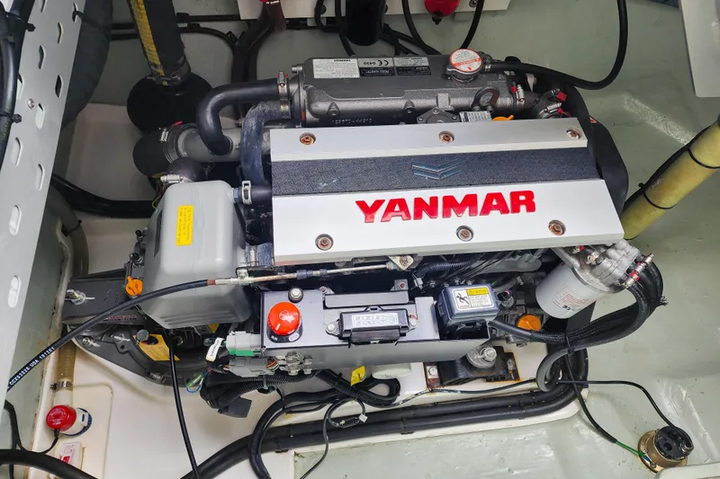 Slide: The Image of Engine compartment of a 2020 Leopard 45 catamaran featuring a Yanmar engine. - 110