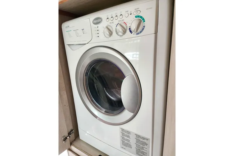 Slide: The Image of Front-loading washing machine in a wooden cabinet, Leopard 45 model, 2020. - 114