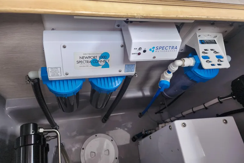 Slide: The Image of Spectra watermaker system in a 2020 Leopard 45 yacht, featuring Newport 1000 model. - 118