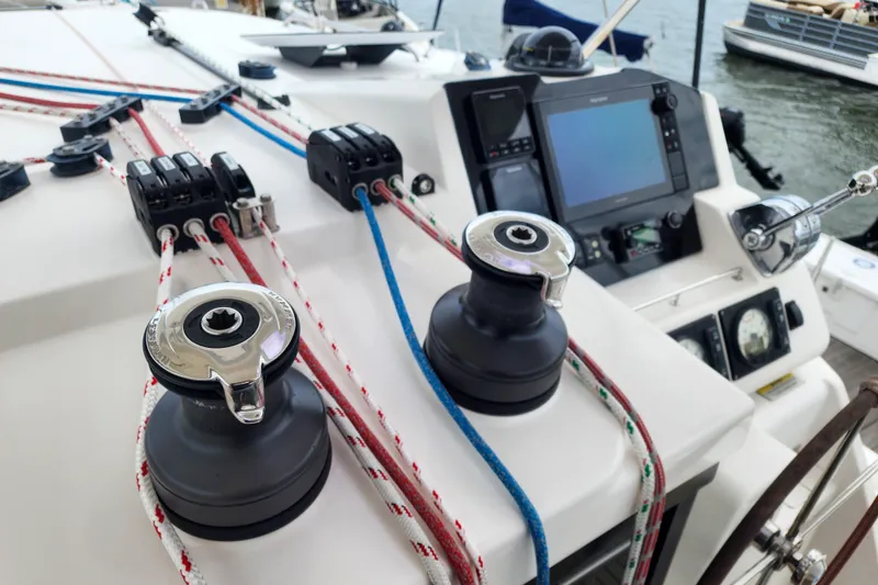 Slide: The Image of Control panel and winches on a 2020 Leopard 45 catamaran yacht. - 31