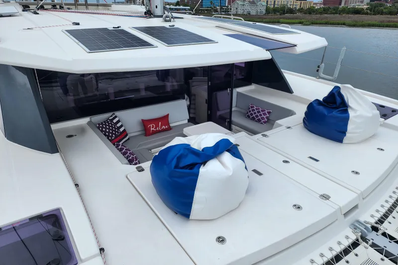 Slide: The Image of Luxurious 2020 Leopard 45 yacht deck with bean bags and cushions for relaxation. - 51