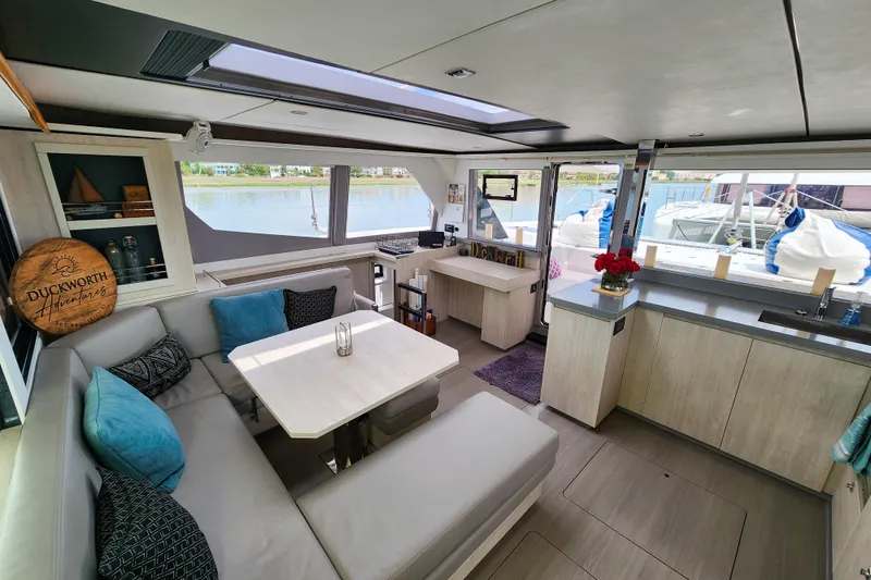 Slide: The Image of Luxurious interior of a 2020 Leopard 45 catamaran with modern furnishings and large windows. - 57