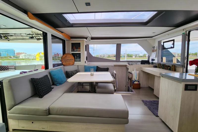 Slide: The Image of Luxurious interior of a 2020 Leopard 45 catamaran with modern seating and panoramic windows. - 58