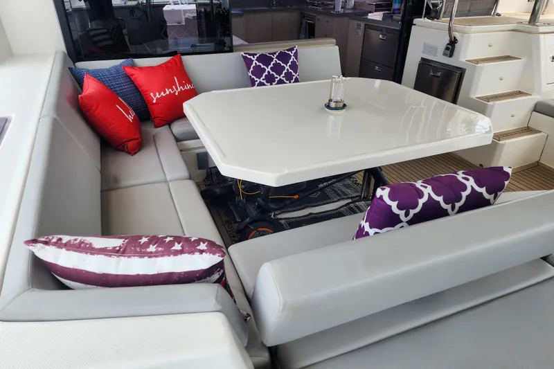 Slide: The Image of Luxurious Leopard 45 yacht interior with cushioned seating and decorative pillows, 2020 model. - 6