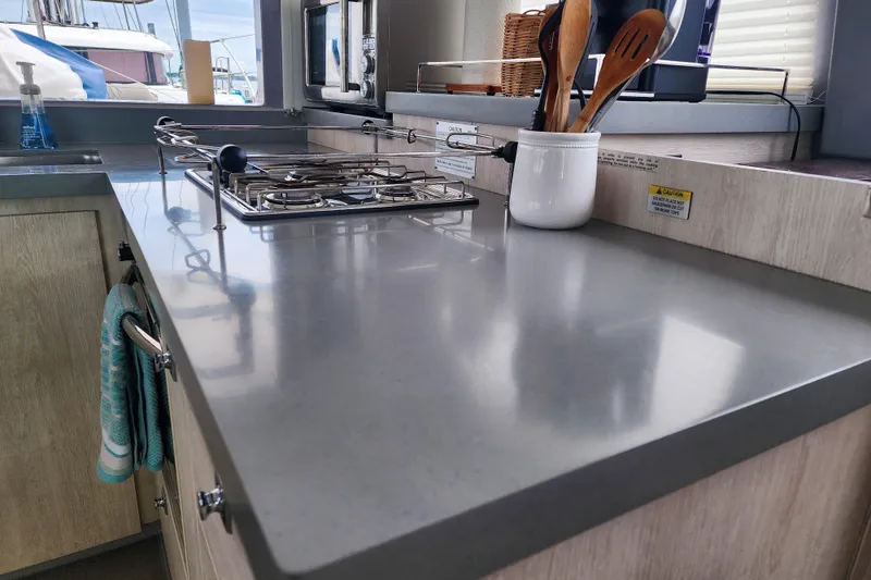 Slide: The Image of Modern kitchen interior on a 2020 Leopard 45 yacht with stove and utensils. - 66