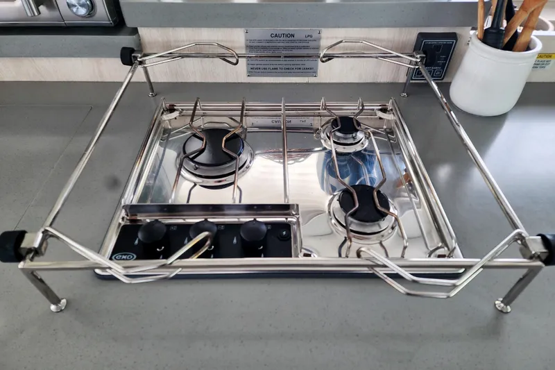 Slide: The Image of Stainless steel gas stove on Leopard 45 yacht, 2020 model, with safety railings. - 67