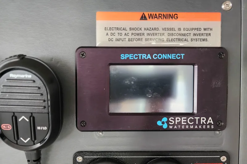 Slide: The Image of Control panel of a 2020 Leopard 45 with Spectra Connect and Raymarine device. - 78