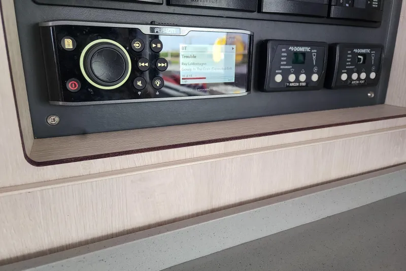 Slide: The Image of Control panel of a 2020 Leopard 45 yacht with audio and air conditioning systems. - 79