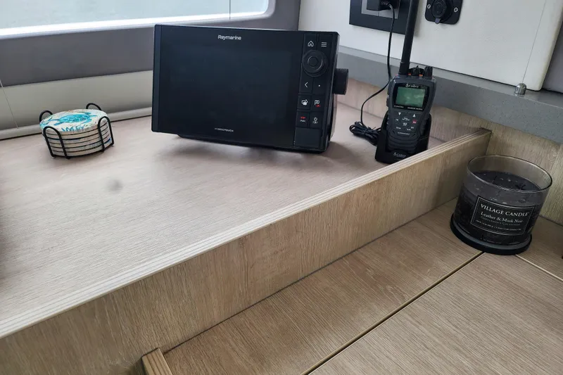 Slide: The Image of Raymarine navigation system and radio on Leopard 45 yacht interior, 2020 model. - 81