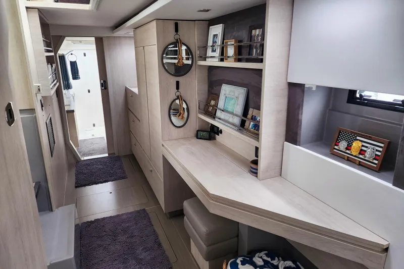 Slide: The Image of Luxurious interior of a 2020 Leopard 45 yacht with modern decor and ample storage. - 85
