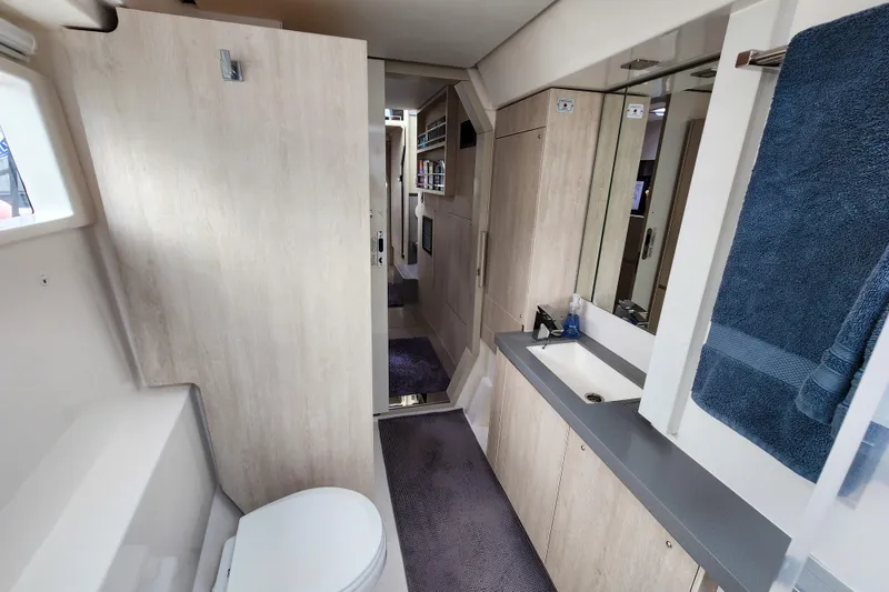 Slide: The Image of Modern bathroom interior of 2020 Leopard 45 yacht, featuring sleek design and amenities. - 90