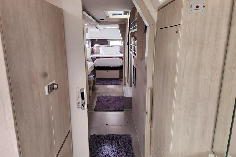 Slide: The Image of Interior of a 2020 Leopard 45 yacht, featuring a cozy bedroom and modern design. - 91