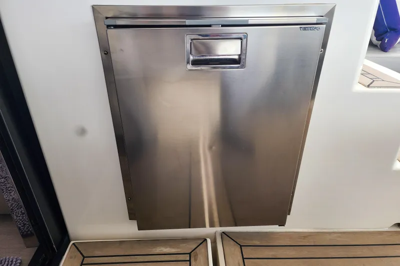 Slide: The Image of Stainless steel door on 2020 Leopard 45 yacht, featuring Vitrifrigo branding. - 93