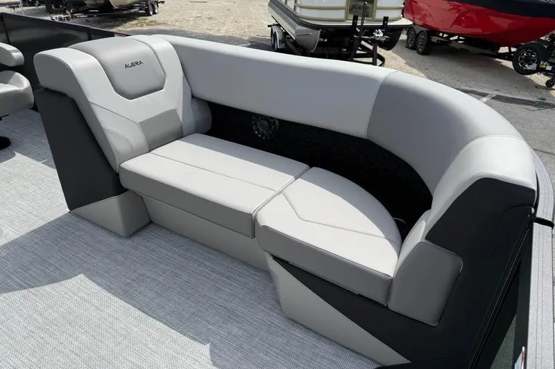 Slide: The Image of Luxurious seating on 2026 Alera 22l boat, featuring sleek gray and black upholstery. - 16