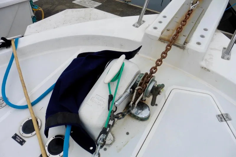 Slide: The Image of Anchor chain and winch on 1988 Bayliner 3888 Motoryacht deck. - 25