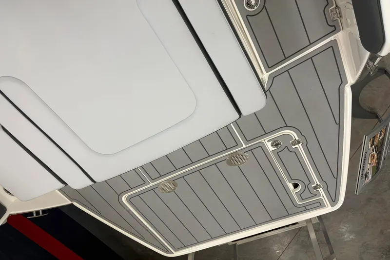Slide: The Image of 2026 Chaparral SSX 4 boat deck with sleek gray and white design. - 10