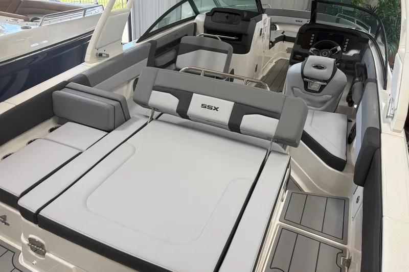 Slide: The Image of 2026 Chaparral SSX 4 boat interior with luxurious seating and modern dashboard design. - 11