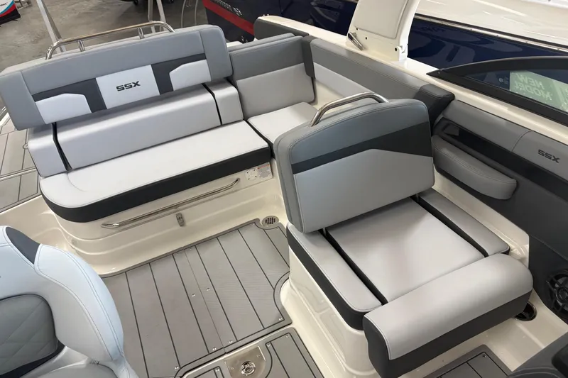 Slide: The Image of 2026 Chaparral SSX 4 boat interior with gray seating and modern design. - 6