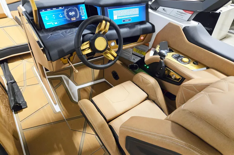 Slide: The Image of Luxurious interior of 2026 Nautique Super Air Nautique G25 Paragon boat cockpit. - 10