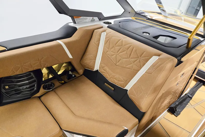 Slide: The Image of Luxurious interior of 2026 Nautique Super Air Nautique G25 Paragon boat, featuring premium seating. - 11