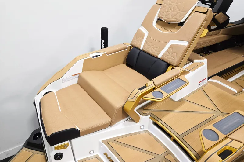 Slide: The Image of Luxurious seating on 2026 Nautique Super Air Nautique G25 Paragon boat. - 13