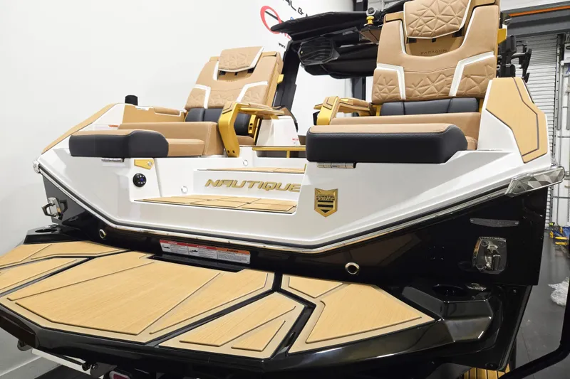 Slide: The Image of 2026 Nautique Super Air Nautique G25 Paragon boat interior with luxurious seating. - 5
