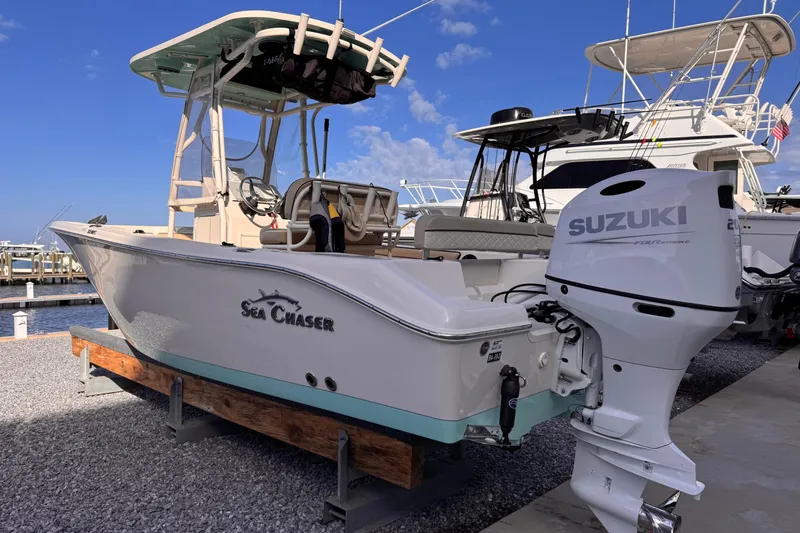Slide: The Image of 2021 Sea Chaser 22 HFC boat with Suzuki outboard motor at marina. - 4