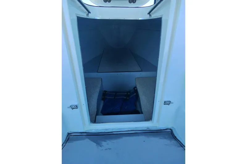 Slide: The Image of 2009 Nor-Tech 4400 Roadster cabin interior with seating and storage space. - 16