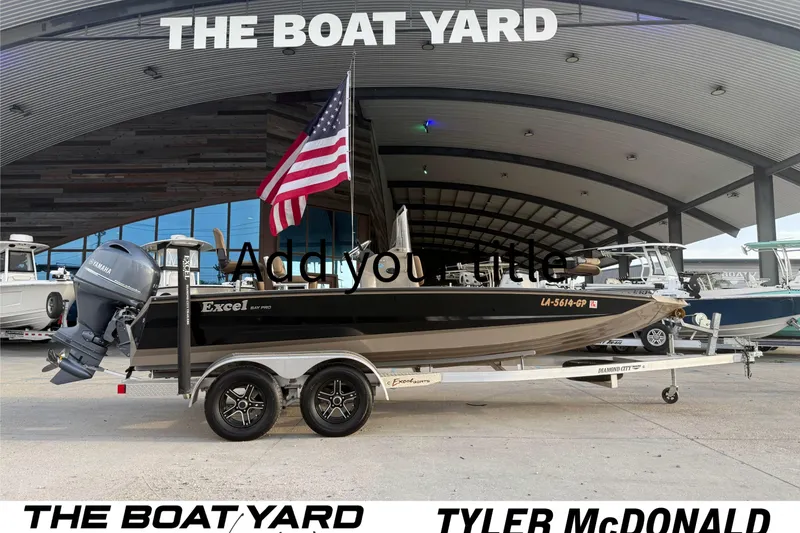 Slide: The Image of 2022 Excel 203 Bay Pro boat with American flag at The Boat Yard. - 11