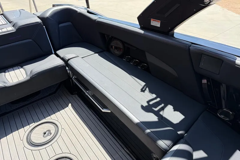 Slide: The Image of 2023 MasterCraft XStar S Piranha interior with sleek seating and modern design elements. - 17