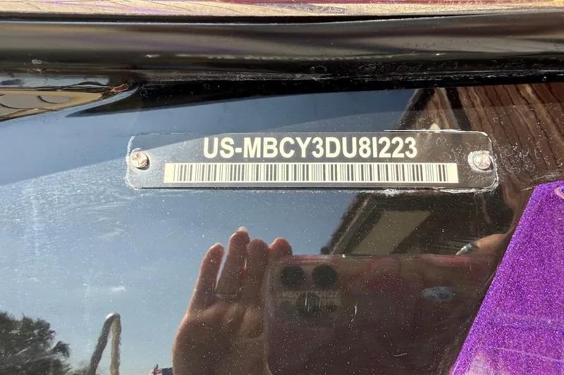 Slide: The Image of 2023 MasterCraft XStar S Piranha hull identification number plate with barcode. - 19