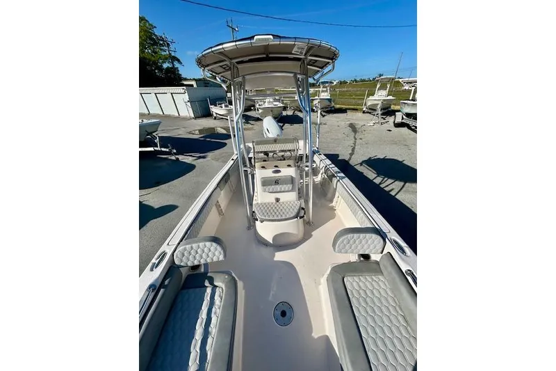 Slide: The Image of 2026 Carolina Skiff 21 Ultra Elite boat interior with seating and console. - 7