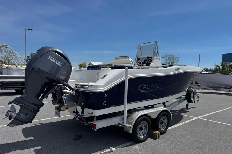 Slide: The Image of 2023 Robalo R202 Explorer boat on trailer with Yamaha outboard motor. - 3