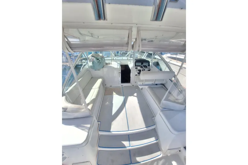 Slide: The Image of 2004 Luhrs 38 Open boat interior with seating and helm station. - 29