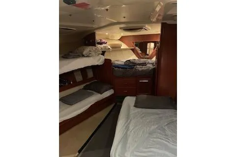 Slide: The Image of Interior cabin of 2004 Luhrs 38 Open yacht with cozy sleeping arrangements. - 31