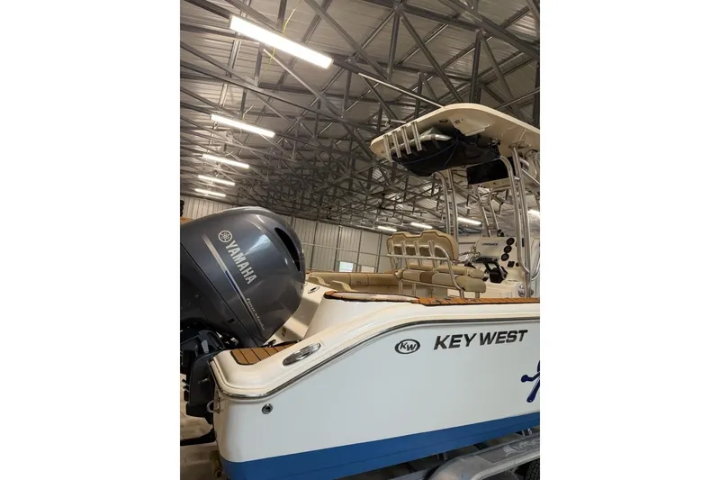 Slide: The Image of 2016 Key West 244 Center Console boat with Yamaha engine in storage facility. - 5
