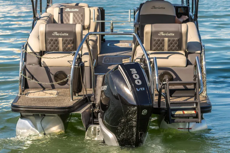 Slide: The Image of 2024 Barletta L23U pontoon boat with Mercury 300 V8 engine on water. - 22