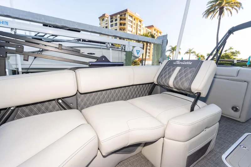 Slide: The Image of 2024 Barletta L23U boat interior with luxurious seating and elegant design. - 50