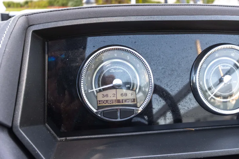 Slide: The Image of Dashboard of 2024 Barletta L23U showing hours and temperature gauges. - 64